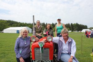 Rachael Tait in the driving seat is supported by ladies from The Glendale Agricultural Society committee.